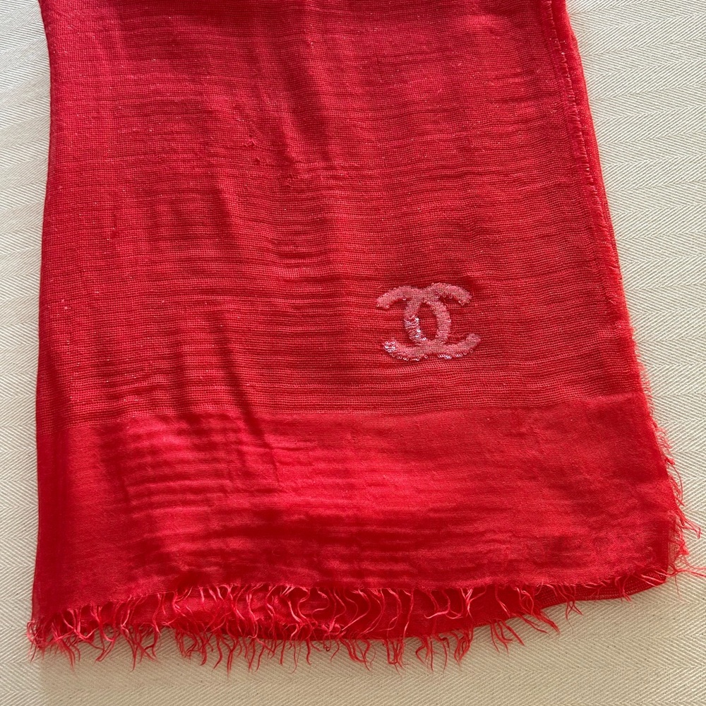 CHANEL Vibrant Red Scarf with Iconic Emblem